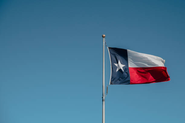Texas state flag on blue sky background