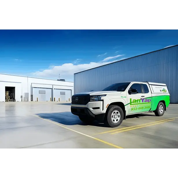 LanYap Pest Control truck parked outside a commercial warehouse.